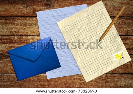 Write the letter on wood table