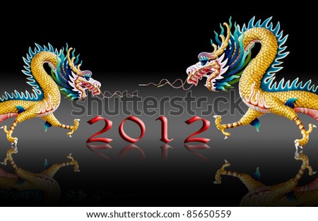 Dragon sculpture with 2012 new year number on glaze black background