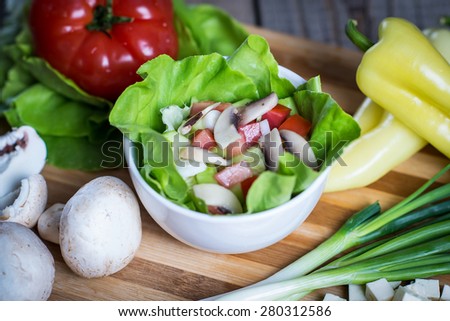 Cottage cheese salad with tomatoes, mushrooms and green onion