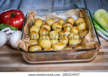Golden roasted potatoes with fresh veggies