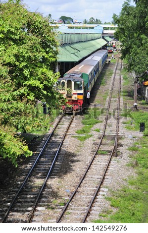 YANGON,MYANMAR - JUNE 3: The railway in Yangon on june 3,2013 in Myanmar.Burma\'s train is not developed, slowly and simple