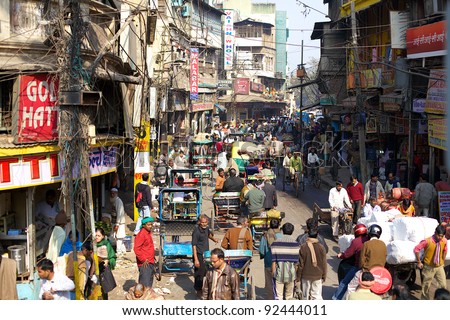NEW DELHI, INDIA - JANUARY 24: Busy Indian Street Market on January 24, 2011 in New Delhi, India. In 2011 Delhi\'s population surpassed 11 million people.