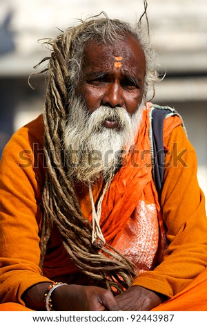UDAIPUR, INDIA - JANUARY 25: Unidentified Indian Sadhu outside the temple on January 25, 2011 in Udaipur, India. Sadhus are wandering monks.