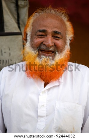 JODHPUR, INDIA - JANUARY 28: Unidentified Muslim Indian man with henna in his hair on January 28, 2011 in Jodhpur, India. Henna is used to color Muslims hair.