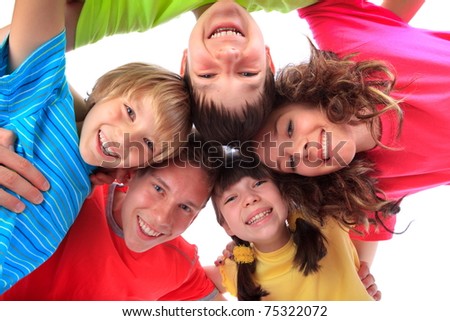 Happy children in family circle smiling.