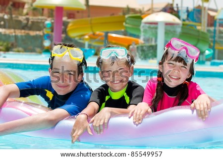 Children snorkeling in pool