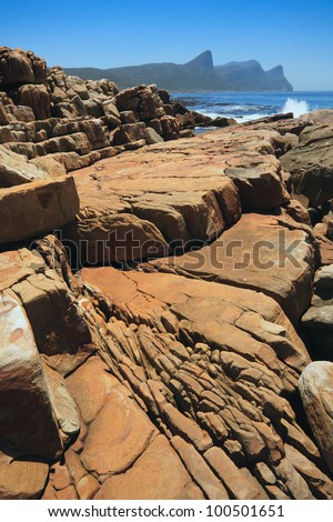 Red rocks near Buffels Bay, Table Mountain National Park Ã¢Â?Â? Cape of Good Hope Section, Cape Peninsula, Western Cape, South Africa.