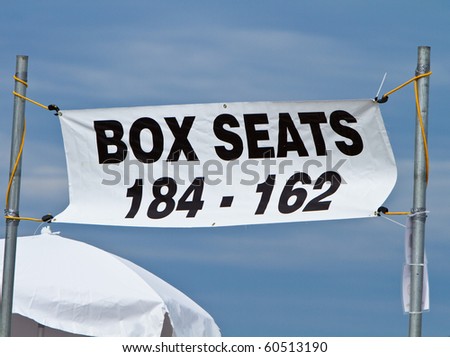 Box seats section market by a banner