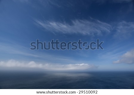 Clouds over ocean seascape - landscape orientation