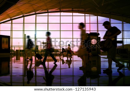 Hong Kong airport, travelers walking