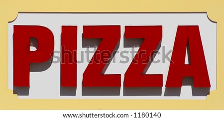 Restaurant sign advertising pizza. This was a large sign associated with a restaurant on a boardwalk.