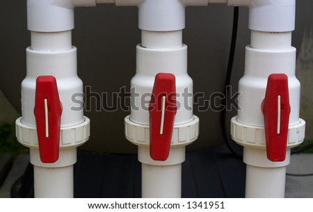 Valves on PVC pipes for a pool filter