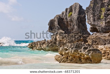 Large rocks, or boulders, in the atlantic ocean in the coastal waters of Bermuda. Photo was taken at Horseshoe Bay in Bermuda.