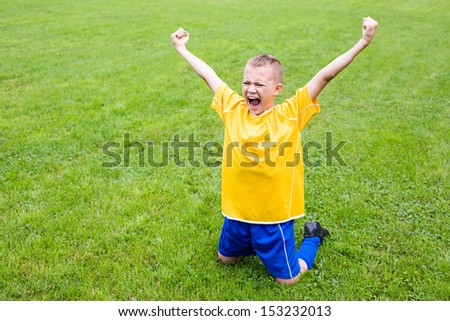 Excited Boy Football Player After Goal Scored.