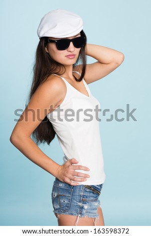 Beautiful young Asian woman in sunglasses. Mixed race Asian Caucasian girl.