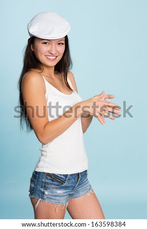 Beautiful smiling asian young woman. Mixed race Asian Caucasian girl.