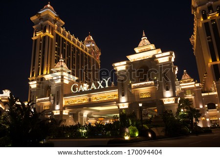 MACAU, CHINA - NOVEMBER 3, 2012: Galaxy Macau - grand casino and hotel complex in the evening. Macau is the gambling capital of Asia and is visited by over 25 million people every year.