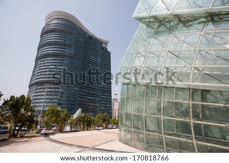 MACAU, CHINA - NOVEMBER 2, 2012: Modern building and Illuminated glass installation in the modern area of Macau. Macau is the gambling capital of Asia and is visited by about 29 million tourists year