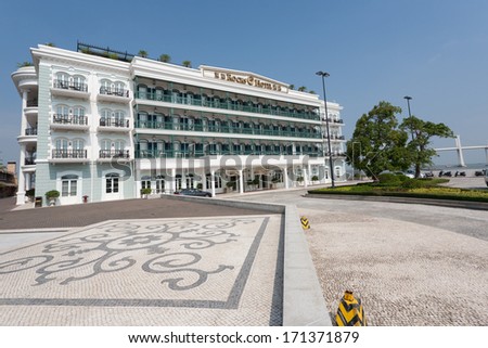 MACAU, CHINA - NOVEMBER 3, 2012: Rocks Hotel located is on the entertainment complex in Macau Fisherman\'s Wharf. Macau has a lot of big and small hotels, and is visited by about 29 million tourists.