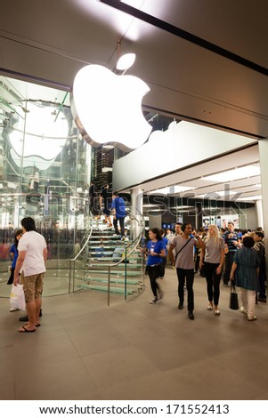 HONG KONG, CHINA - NOVEMBER 11, 2012: Buyers at the entrance at Apple store in Hong Kong. Store is in a shopping center IFC Mall, it is very popular with locals and tourists visiting Hong Kong.