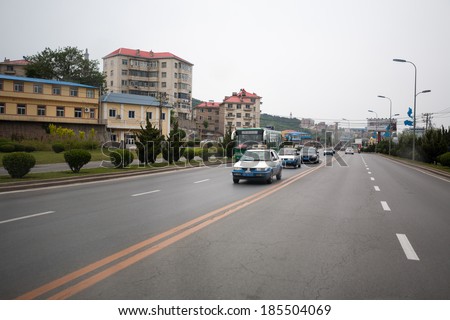 LUSHUN, CHINA - JUNE 10, 2012: Streets port city Lushun, russian name Port Arthur, is now a naval base in China. Here was the epicenter of the main events of the Russian-Japanese war of 1904-1905.