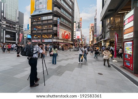 OSAKA, JAPAN - MAY 28, 2008: Dotonbori street is one of the main attractions of Osaka. Street is very popular among tourists and locals, here are the many restaurants and cafes, shops and nightlife.