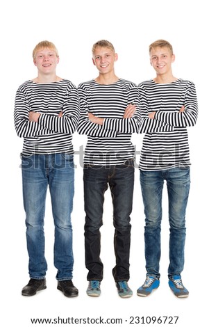 Guys in a striped shirts with arms crossed. Two of the boys twin brothers.