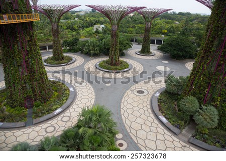 SINGAPORE - JANUARY 27, 2015: Gardens by the Bay was crowned World Building of the Year at the World Architecture Festival 2012. Park is very popular holiday destination with tourists and locals alike