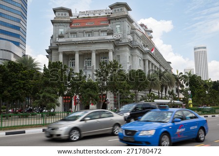 SINGAPORE - FEBRUARY 18, 2015: Famous The Fullerton Hotel in Singapore is a five-star luxury hotel located on the Fullerton Road. Commissioned in 1919.