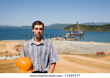 Builder.Construction of new seaport(oil harbor).Floating cranes.