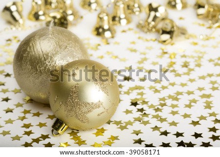 Christmas Balls and gold decoration stars, bells,candle.