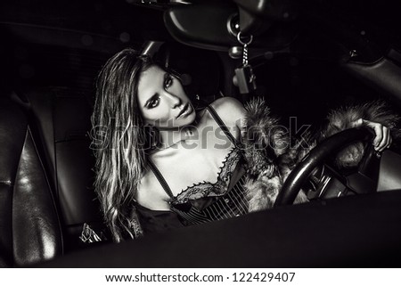 Luxury woman in a car.