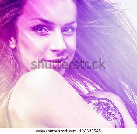 Beautiful sensual fashion woman. Multicolored pop art photo toned purple.