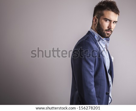Elegant Young Handsome Man. Studio Fashion Portrait.