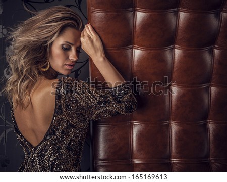 Young Sensual &Amp; Beauty Woman Posing On Luxury Leather Sofa.