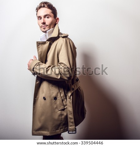 Elegant handsome man in stylish coat.