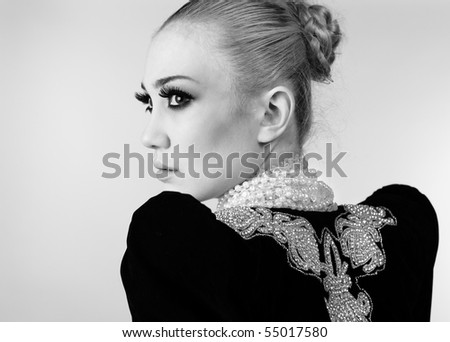 Attractive model in exclusive design clothes on manners old-slavic. Black&White photo.