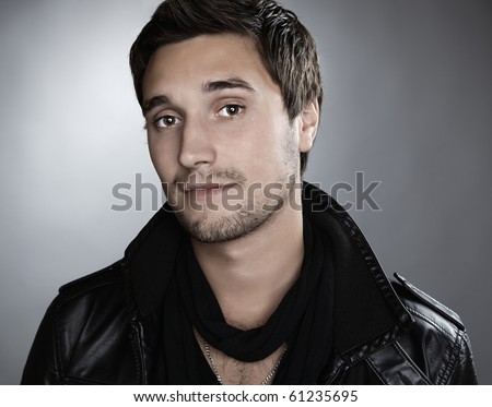 Closeup portrait of sensual man with beautiful face and eyes