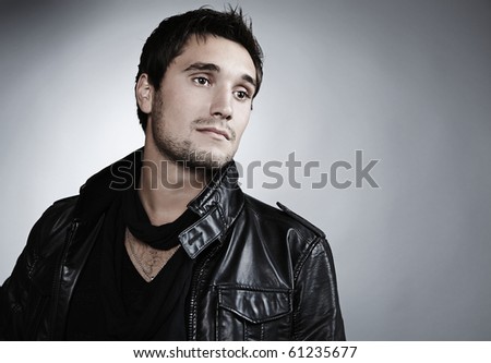 Closeup portrait of sensual man with beautiful face and eyes