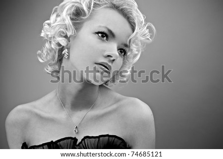 Young blond woman portrait.Black-white photo.