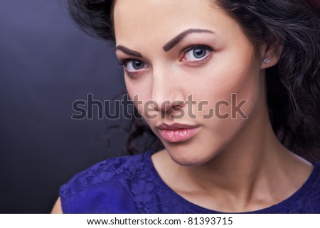 Amazing portrait of beautiful young caucasian woman. Close-up face studio photo.