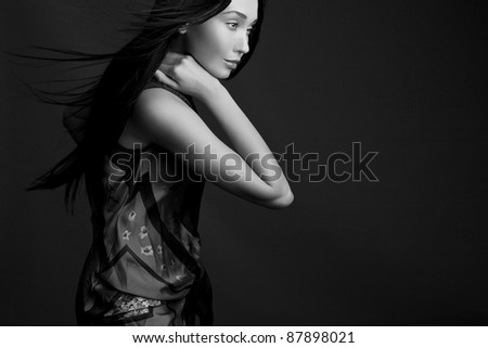 Portrait of a beautiful brunette woman. Black-white Fashion Photo.