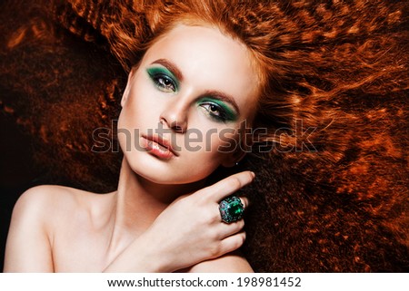 Red Hair. Fashion Girl Portrait with windy hair