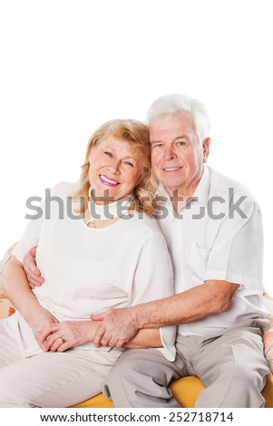 Happy and smiling elderly couple posing together