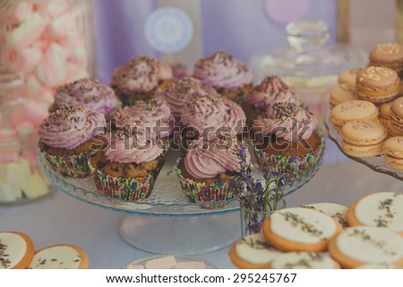 Closeup of cupcakes with flowers at fancy party