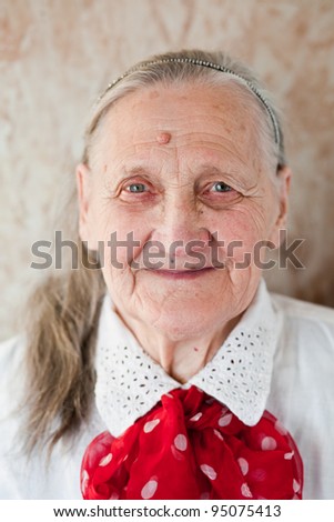 Portrait of the old smiling woman