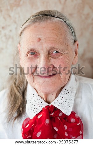 Portrait of the old smiling woman