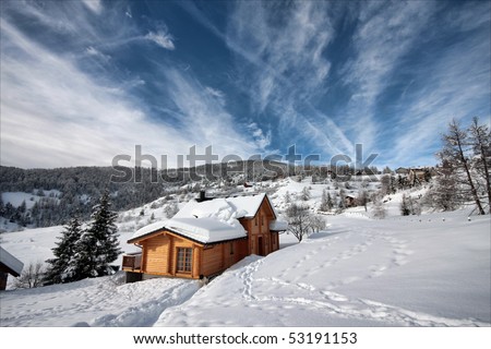 Chalet under the snow in winter