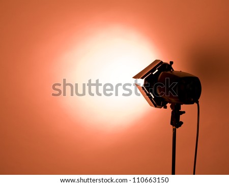 empty studio background and flash light on light red