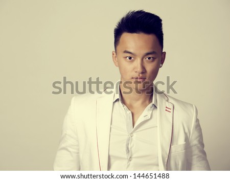 casual man wearing white jacket and black pants vintage style photo